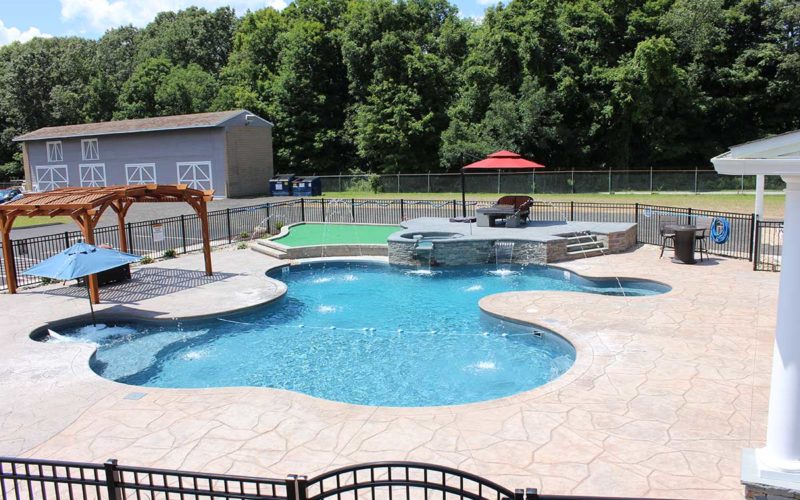 Custom inground pool installed by Majestic Pools