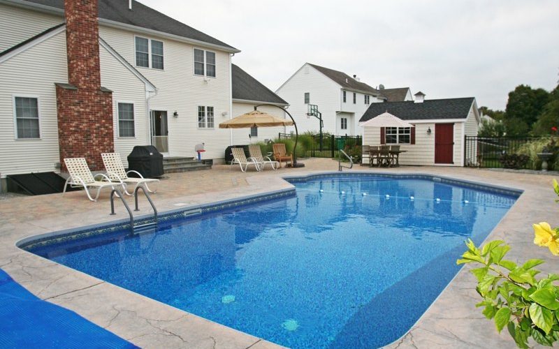 This is a picture of a Custom Lazy L Inground Pool installed by julianos