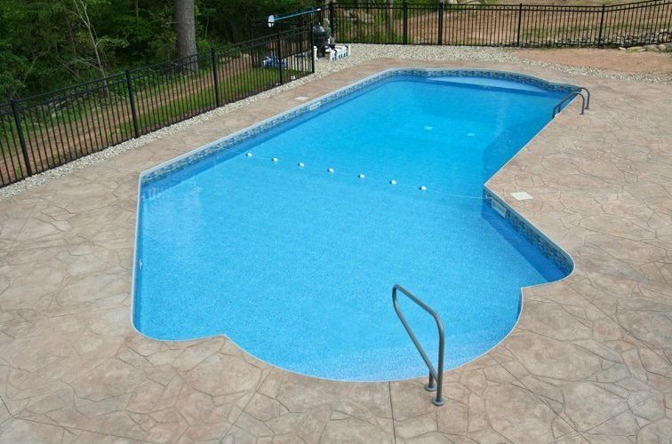 This is a picture of a Custom Lazy L Inground Pool installed by julianos