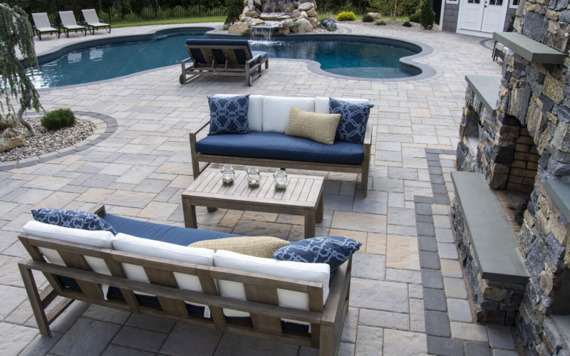 Custom inground pool and living space installed by Majestic Pools