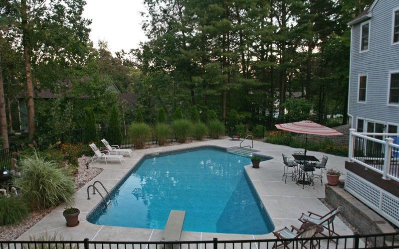 This is a photo of a Lazy L style custom inground swimming pool.