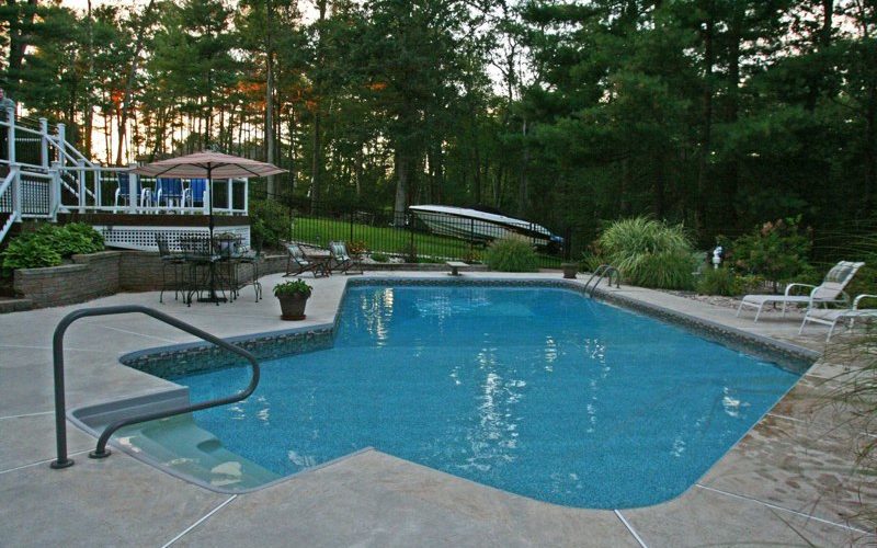 This is a photo of a Lazy L style custom inground swimming pool.