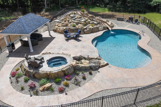 This is a photo of a mountain pond style inground swimming pool.